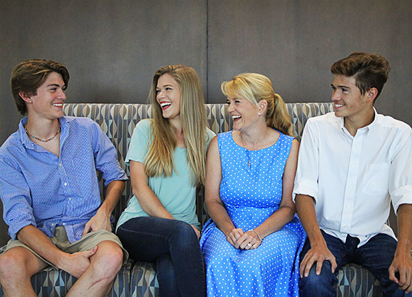 The Hicks family (from left to right) with son, Jonhathan, daughter Amber, mother Christina, and eldest son, Christian share a moment together at their, “home away from home,” Central Georgia Technical College. Since, 2013 each of them has been enrolled in a class at CGTC.