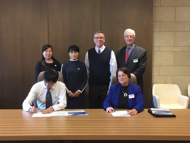 CGTC leadership join officials from Guangzhou Information Engineering Vocational School as they sign an agreement for mentoring in the implementation of occupational programs in the southern Chinese region. 