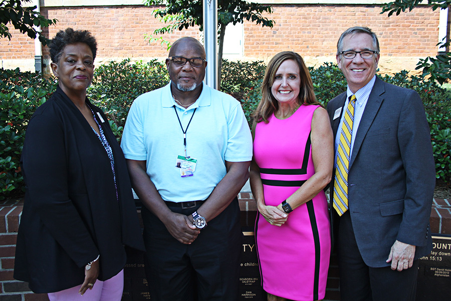 Carla Best, program manager for the Office of Re-entry Services at CGTC, joins CGTC Business Customer Service and Technology instructor, John S. Harvey, Dr. Heather Corbett, director of Career, Technical and Post-Secondary Education for GDC, and CGTC executive vice president, Jeff Scruggs for a photo. The photo followed Harvey’s recognition by the Georgia Department of Corrections as a finalist for the GDC Vocational Instructor of the Year for 2017. 