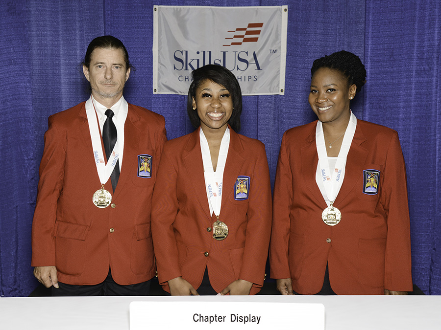 First place winners from CGTC’s SkillsUSA organization celebrate their first place victory in the Chapter Display category of the SkillsUSA Nationals in Louisville, Ky., in June. (From left to right) Thomas Butler, QaNeshia Mays, and Alison Crumb show off their gold medals following the awards ceremony.