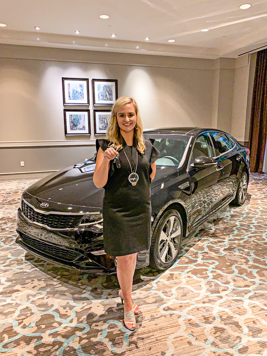 Heather Williamson holds the keys to a brand new KIA Optima, the grand prize for her award as the state’s top technical college student.