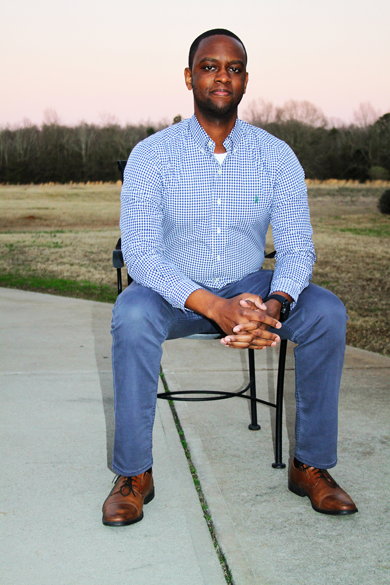 Joshua Brown seated 