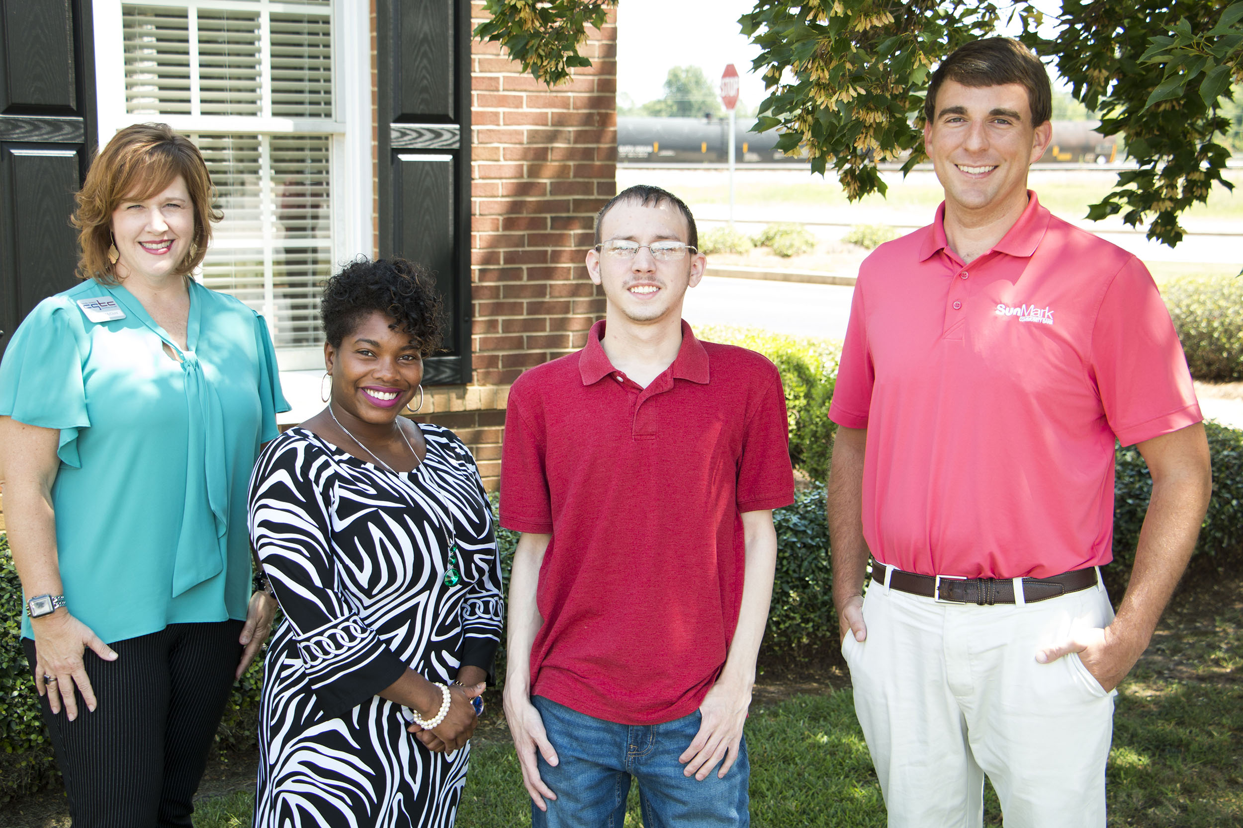 Tonya McClure, assistant vice president for Advancement at CGTC, and Carmen Davis, CGTC advancement specialist, join Austin James Smith an upcoming first-year student at the College as he receives recognition from Andrew Taunton, SunMark Community Bank Commercial Lender, Fort Valley Branch.