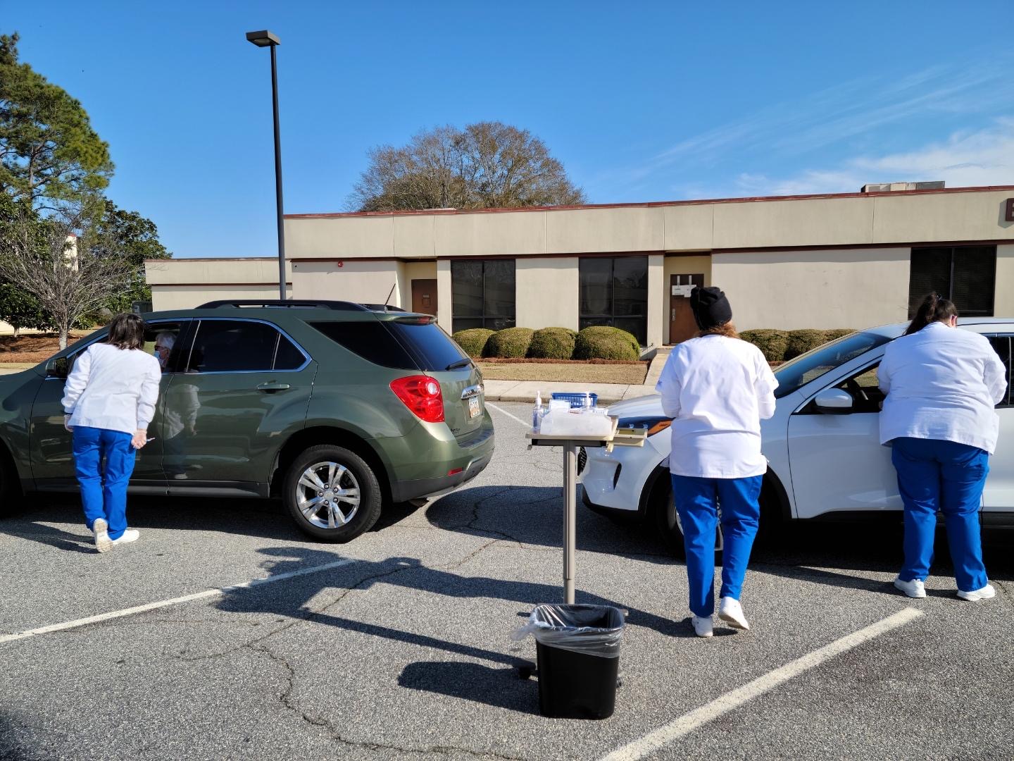Three RN students help register and administer the Moderna COVID-19 vaccine during Taylor Regional Hospital’s drive-thru clinic on January 13. 