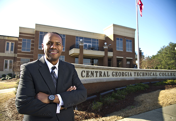 Dr. Ivan Allen stands before the front entrance. 