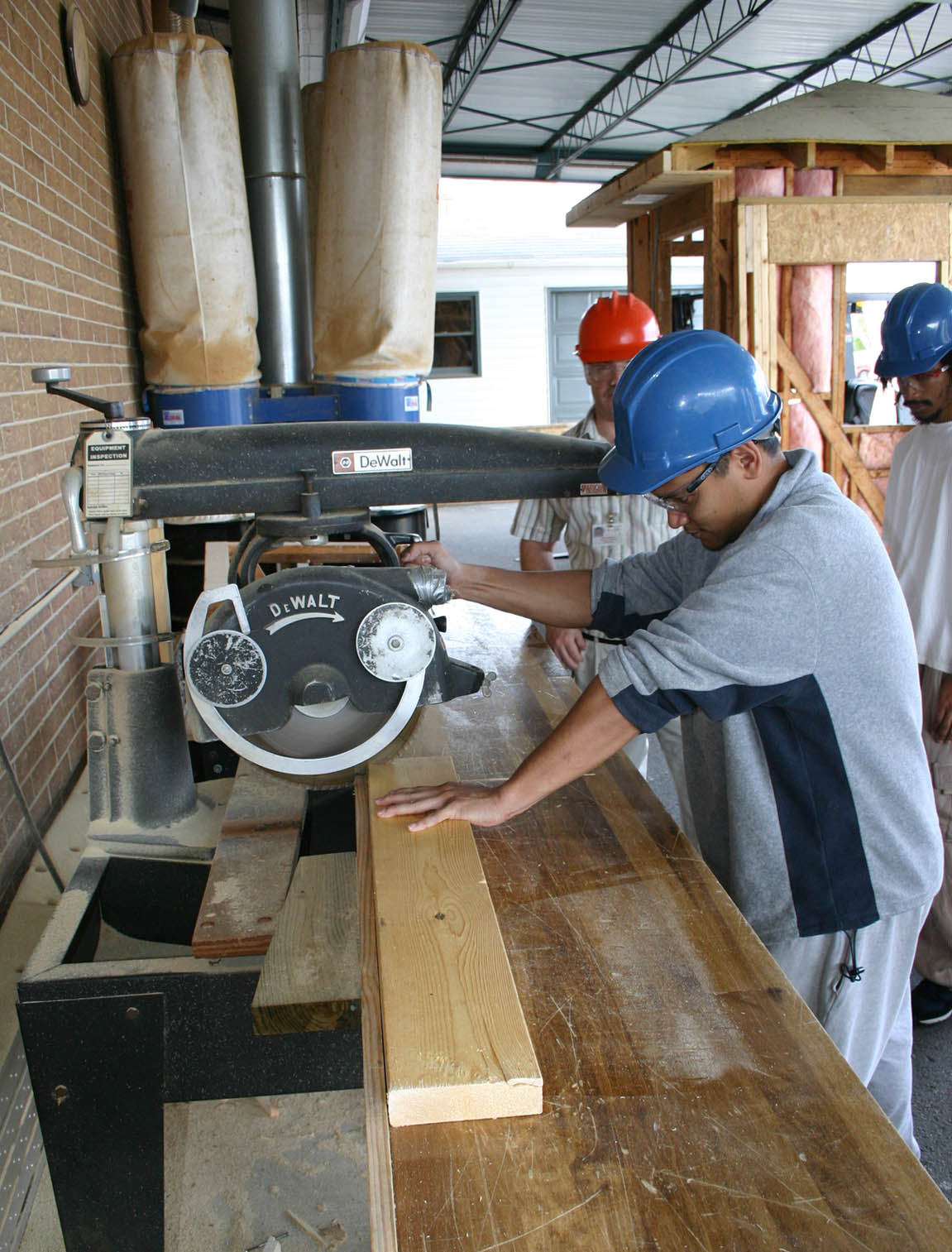 CGTC Student uses saw in construction lab