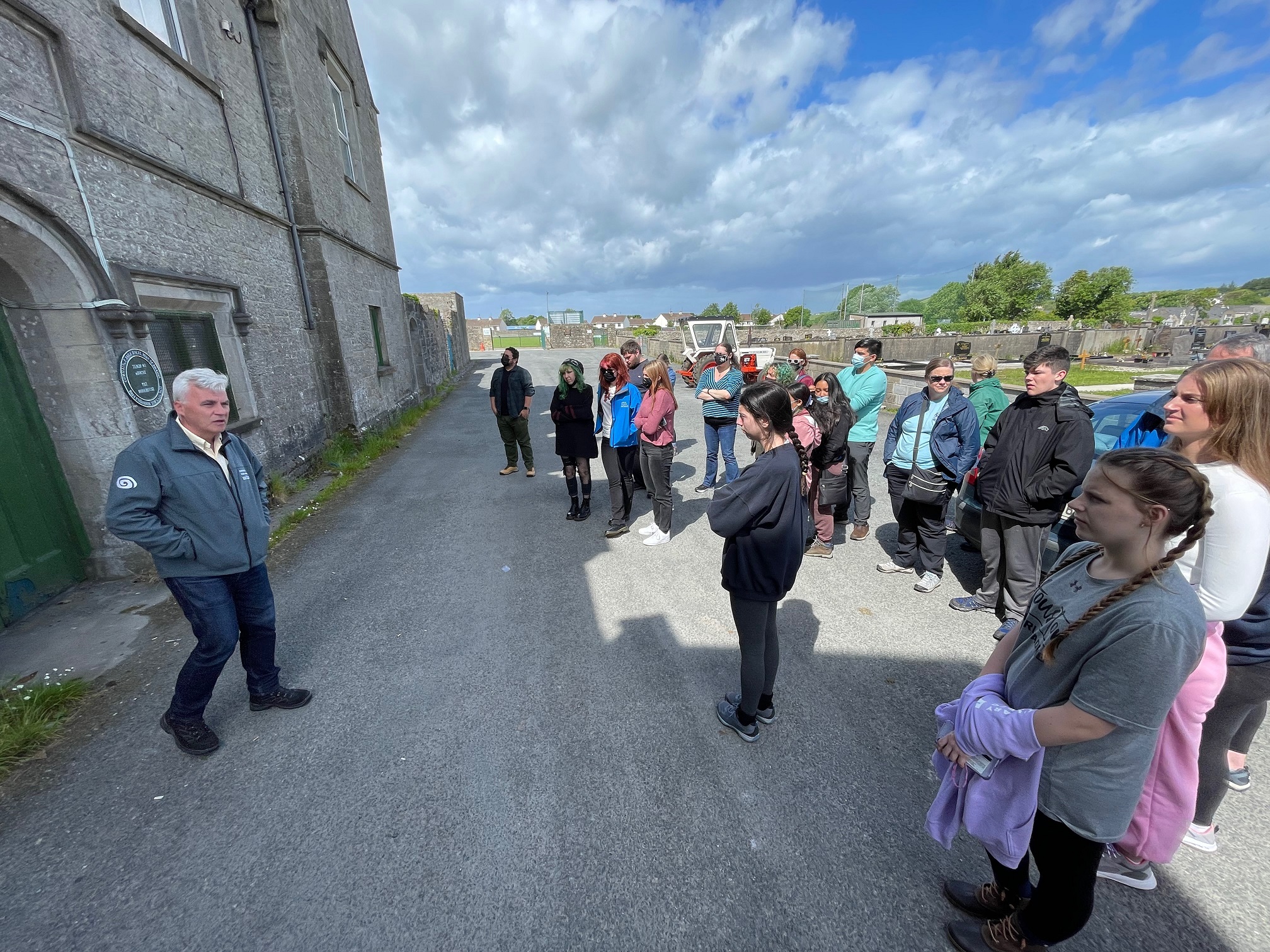 Students learn from Irish guide.