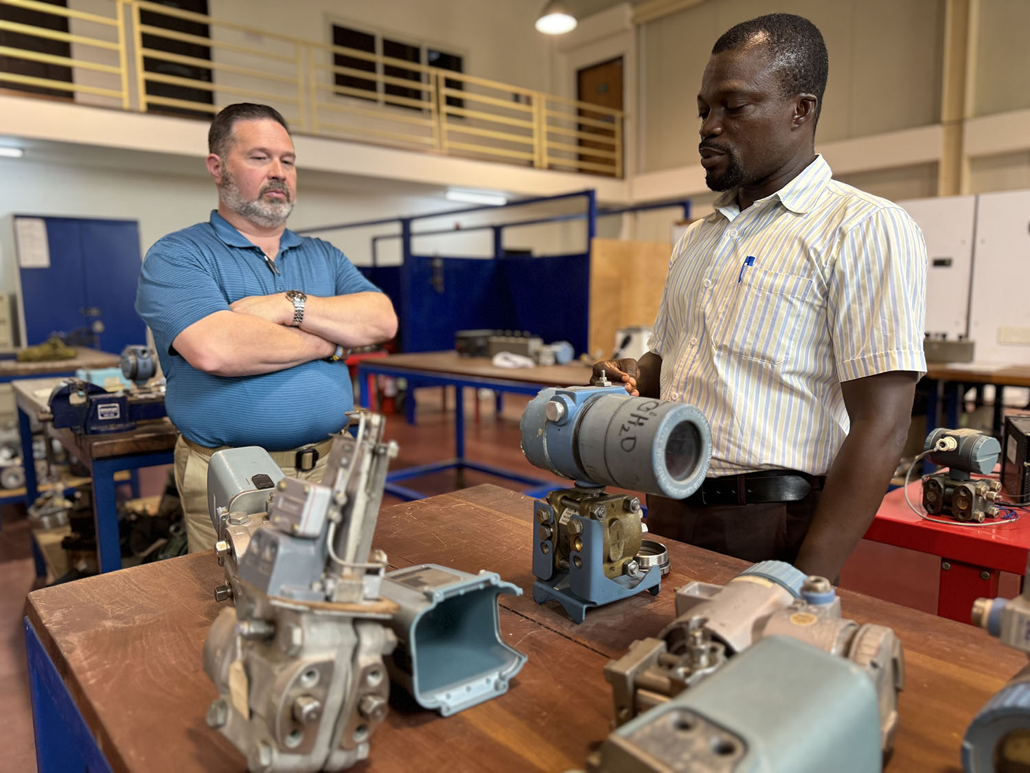Mike Pace with faculty in an industrial lab