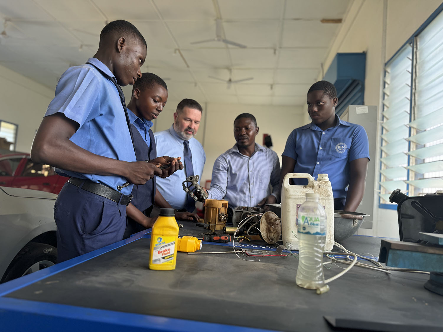 CGTC staff with students in school in Ghana