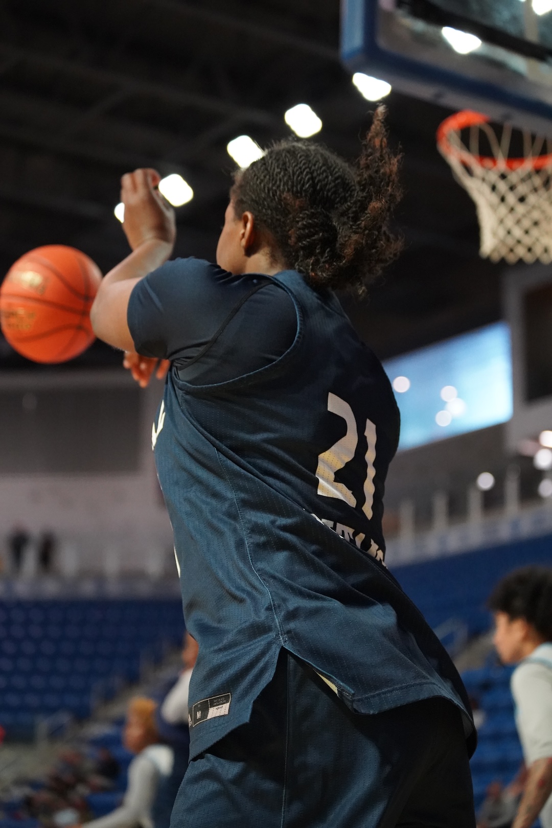 Number 21, Aryana Thomas , inbounds the ball against state fair college