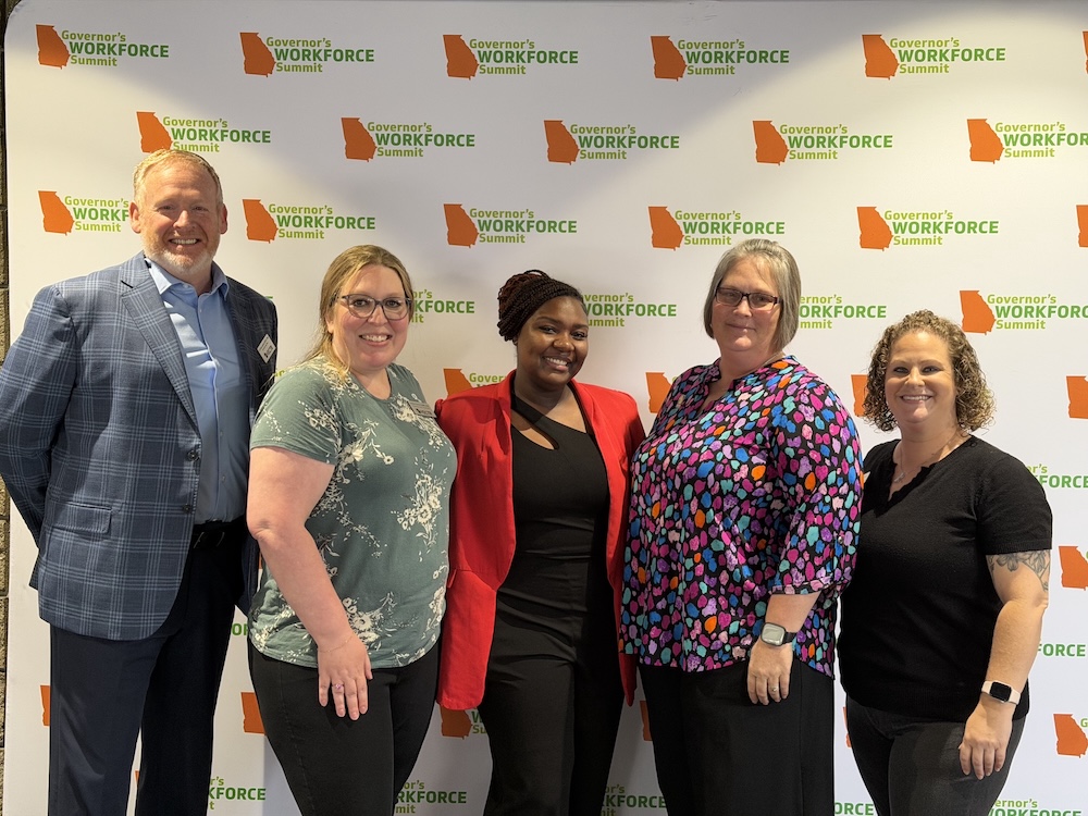 Che’la Pharms gathered with CGTC and VECTR Center Staff