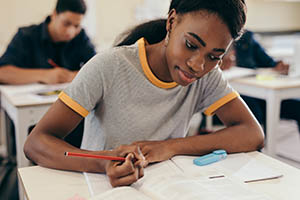 Young woman studying at the university